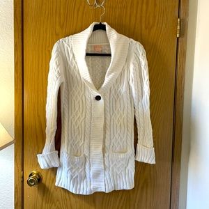 White Sweet Romeo cardigan sweater.